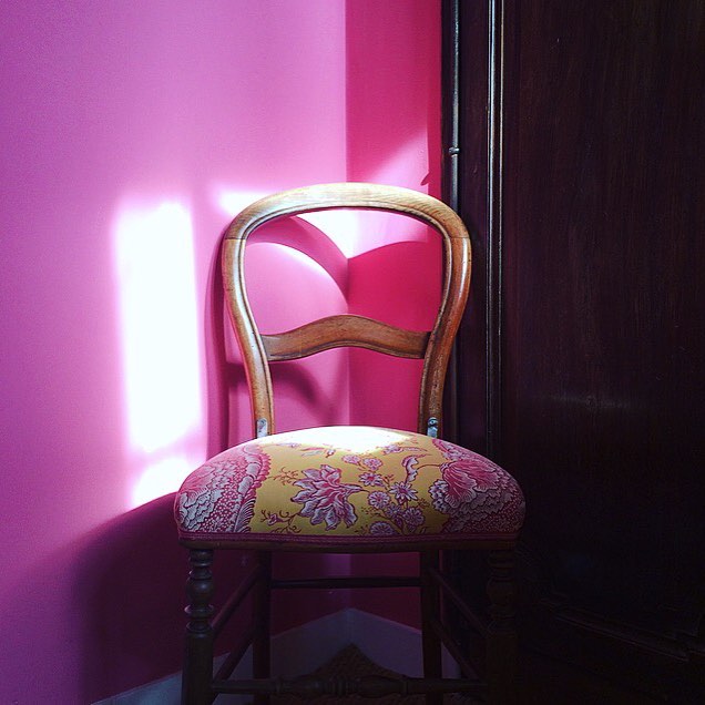 Antique fashionable chair in the corner of a interior designer room